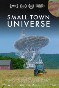 MV5BMDlhNTBiZDgtZTc5ZC00MDNjLWJmMDktMWI3Y2MwZmU5MDllXkEyXkFqcGc@._V1_FMjpg_UX1000_ Image of movie poster for small town universe. It is an image of a field with a tractor and modern architecture behind it.