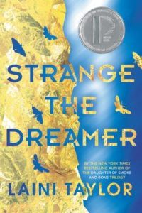 strange the dreamer Book cover for Strange the Dreamer by Laini Taylor. Image is half gold and half blue with moths and fireflies flying across.
